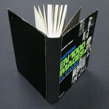 Rebacked book with cover partially open