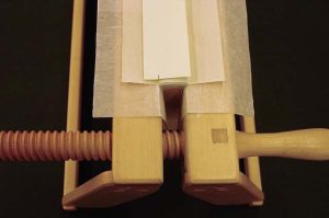 Marking the width of the Mohawk paper spine stiffener
