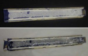 Cleaning the inside of the original spine piece to prepare for attaching over the new spine