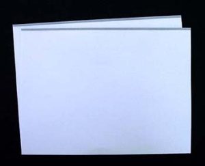 Endsheets with hinge cloth attached, showing the other side