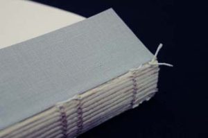 Knot tied after the endsheet is sewn on