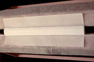 Adhering the spine inlay