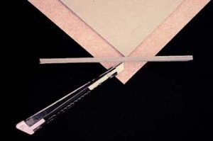 Trimming the book cloth corners