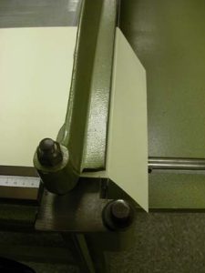 Making the first crease on the board shear