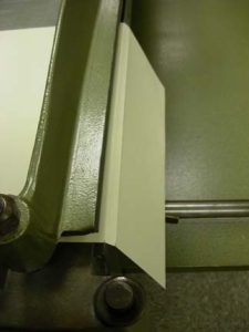 Second crease is made on the board shear