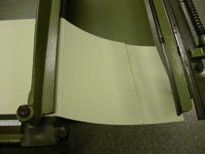 Fourth crease made on the board shear