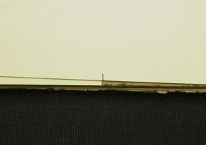 Marking where to trim the excess of the first board