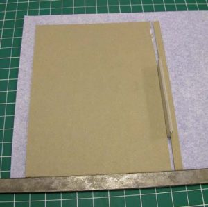 Marking the position of the spine inlay with a spacer
