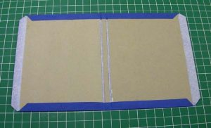 Turning in the cloth edges of the cover