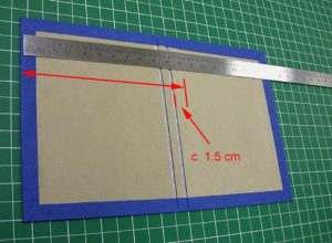 Measuring for the piece of cloth to cover the inside front cover