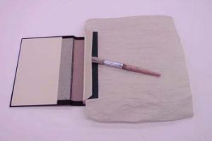 Text block position on the cover and prepared for gluing the hinges