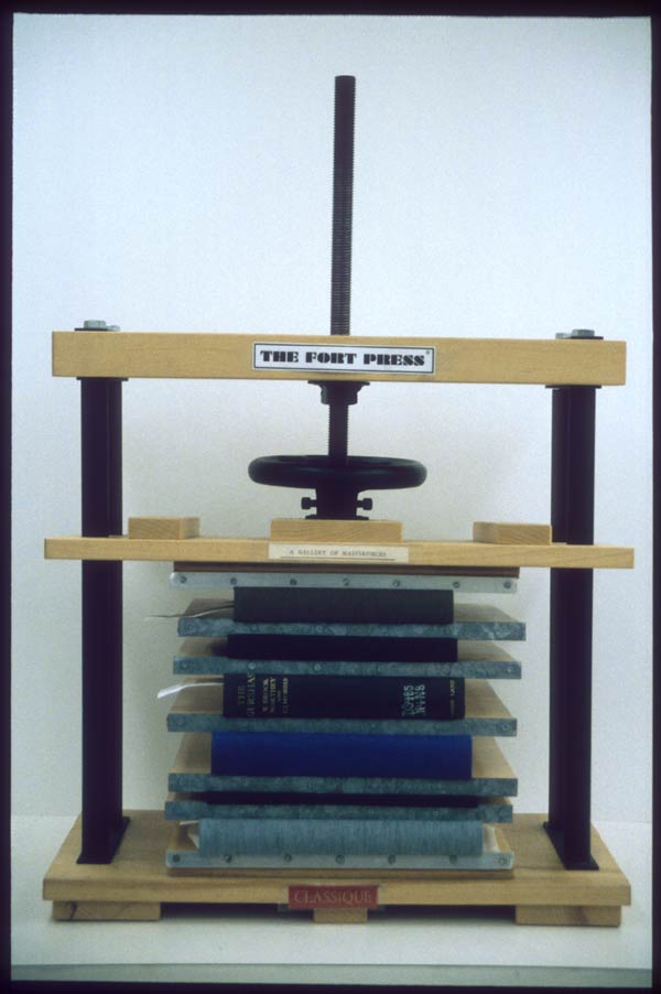 Small standing press with book and edge boards