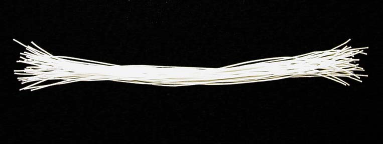 Wax coated thread cut to the length used for the closure of phase boxes
