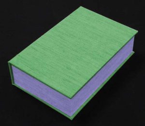 Color-coded illustration of cloth covered clamshell, closed