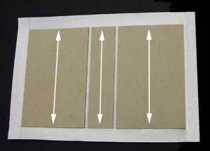 Grain direction indicated by arrows for the C tray