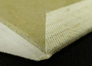 Turning in the the little bit of cloth to cover the corner of the box cover