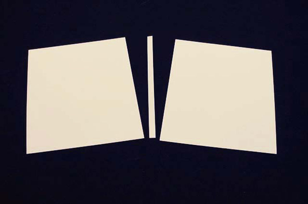 The three cut pieces of gray white board for the Kyle Wrapper cover