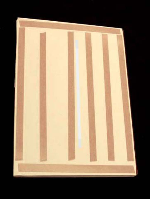 Back of inner wrapper with double sided tape affixed