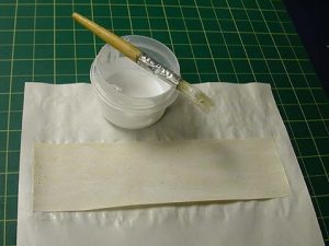 Adhesive applied to the super