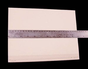 Measuring the text block to determine the size of the boards for the new cover