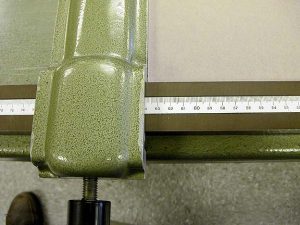 Cutting the spine stiffener