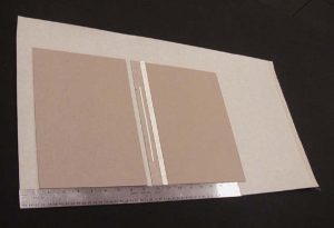 Using the spacer template to position the second board