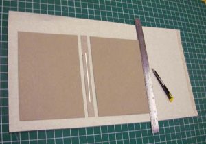 Trimming off excess width of cloth