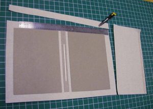 Trimming excess height of book cloth