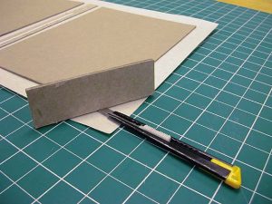 Trimming the book cloth corners to 45 degrees