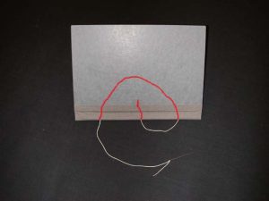 Sewing going from inside bottom hole to top hole inside