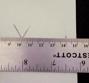 Measuring for placement of the tab