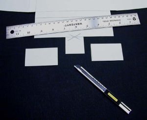 Excess is cut away to make the flap