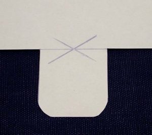 Flap after corners are rounded by cutting with scissors