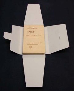 Book inside the open tuxedo box