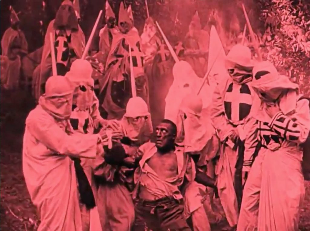 Gus surrounded by the Klan (screen capture by author).