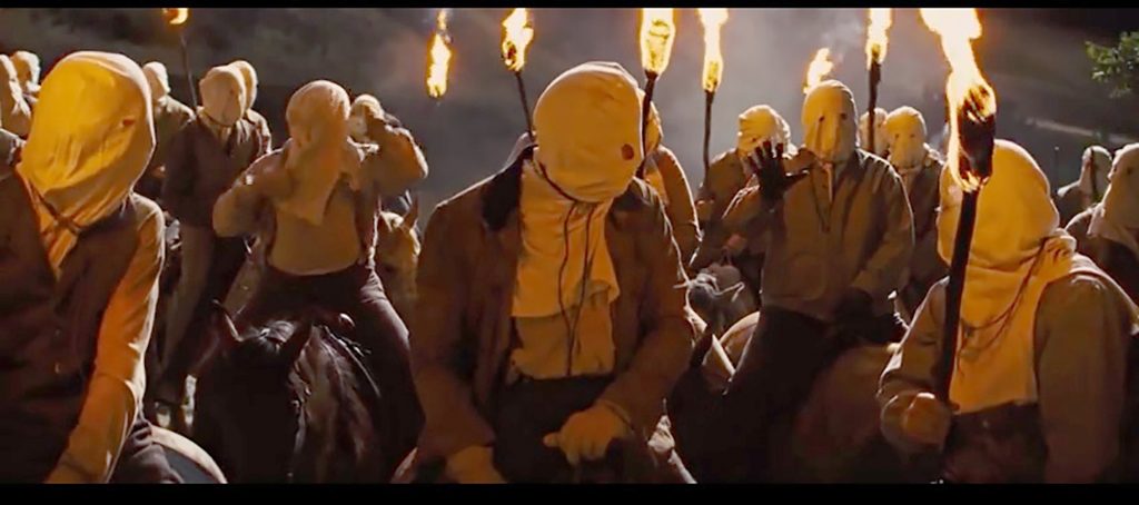 Still of the vigilante gang from Django Unchained (screen capture by author).