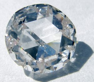 A diamond with inclusions visible to the naked eye