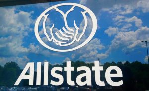 A window with the Allstate insurance company logo.
