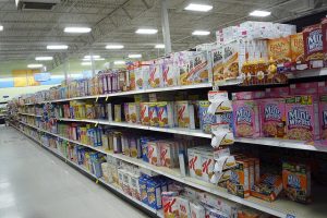 A supermarket aisle of cereal boxes.
