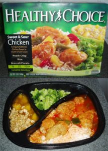 A Healthy Choice brand frozen dinner package and meal tray.