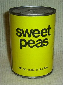 A can with a generic Sweet Peas label. The label uses plain text with no brand name or logo.