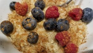 oatmeal with blueberries, raspberries, and cinnamon