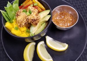 peanut tofu bowl with avocado and snow peas