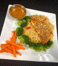 Almond crusted fish on rice with broccoli and carrots